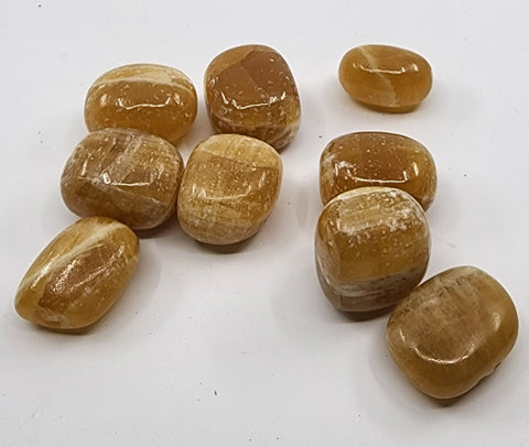 Tumbled Honey Calcite for healing the mother wound